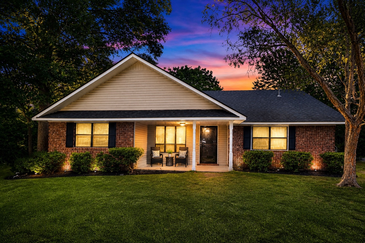 The welcoming front porch of Jennie House in Goose Creek at dusk